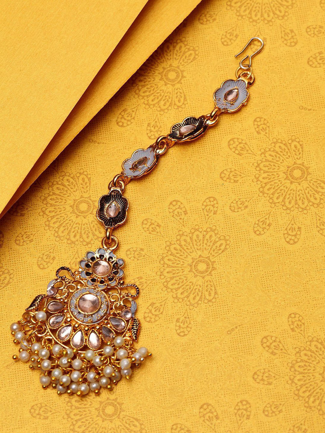 

Anouk Gold-Plated Kundan Stone Studded & Pearls Beaded Ganthan Enamelled Maang Tikka