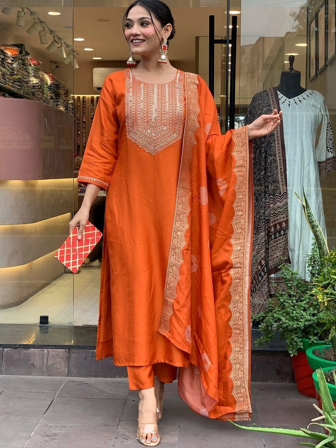 

KALINI Embellished Round Neck Kurta With Trousers & Dupatta, Orange