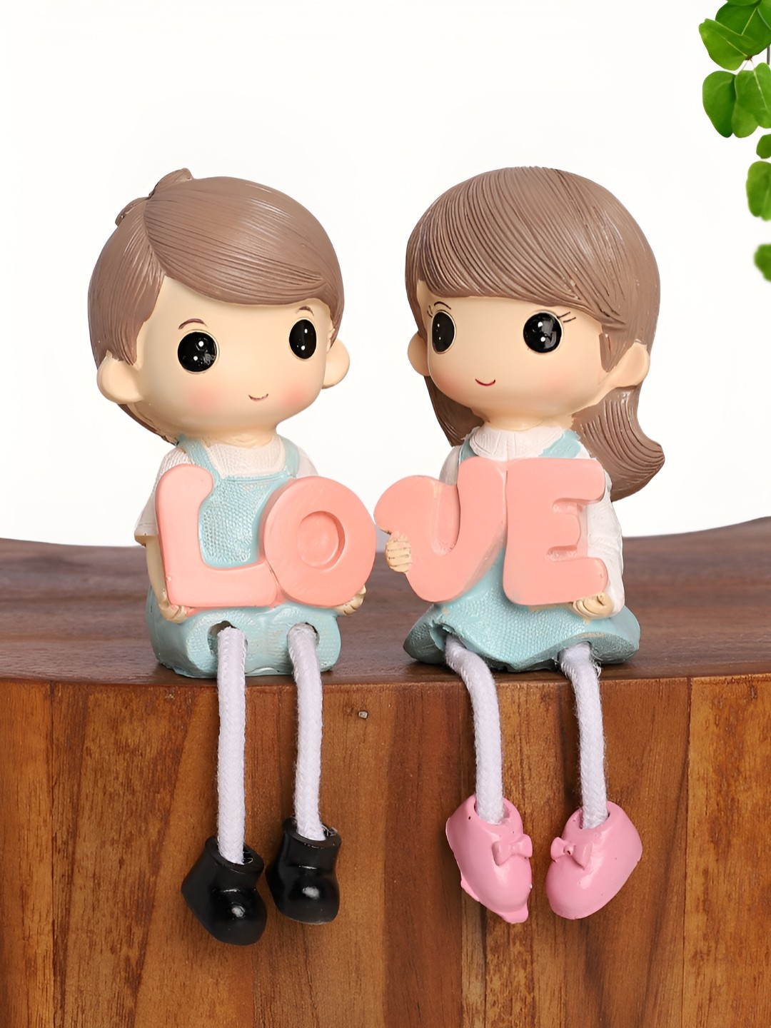 

INTERNATIONAL GIFT Blue And Pink LOVE Sign & Dangling Legs Figurine Showpiece
