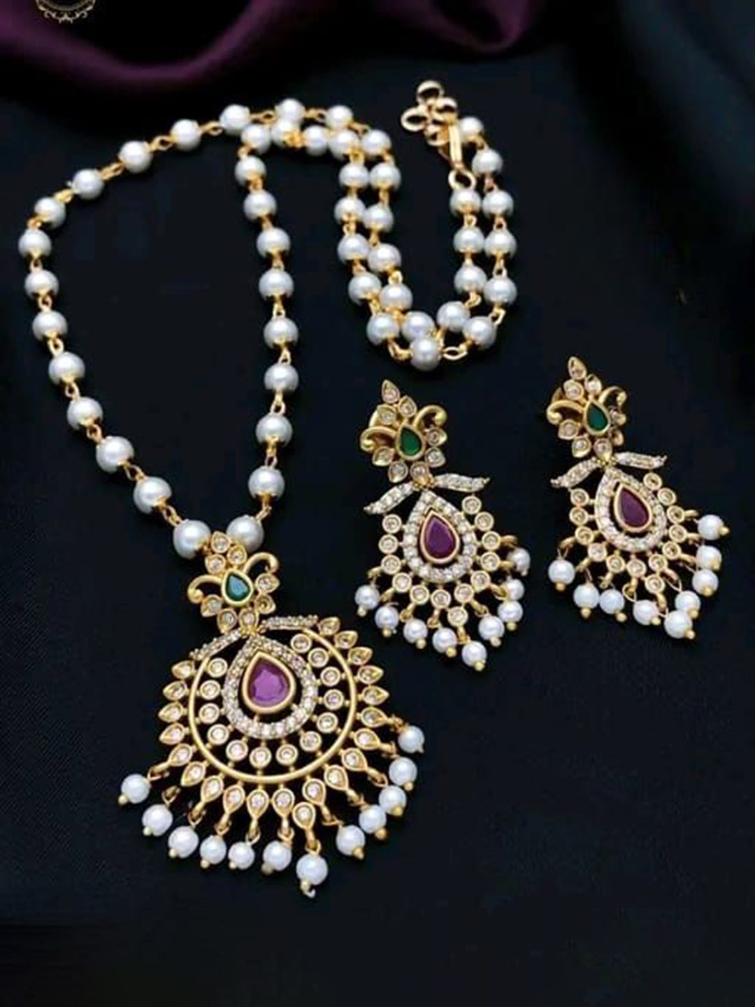 

Rujve Jewellery Gold Plated Cubic Zirconia Studded & Beaded Traditional Jewellery Set