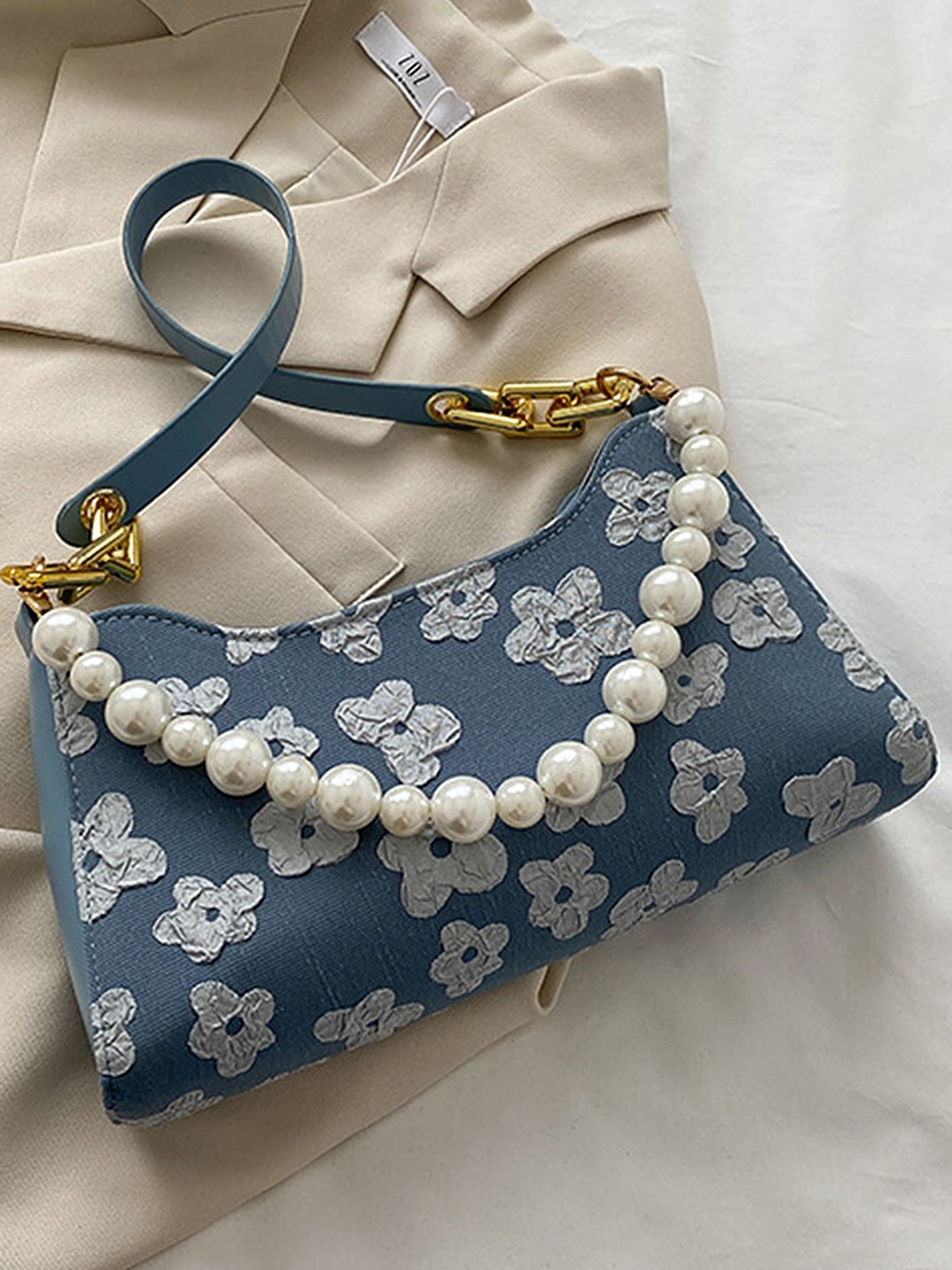 

LULU & SKY Textured Structured Handheld Bag with Tasselled, Blue