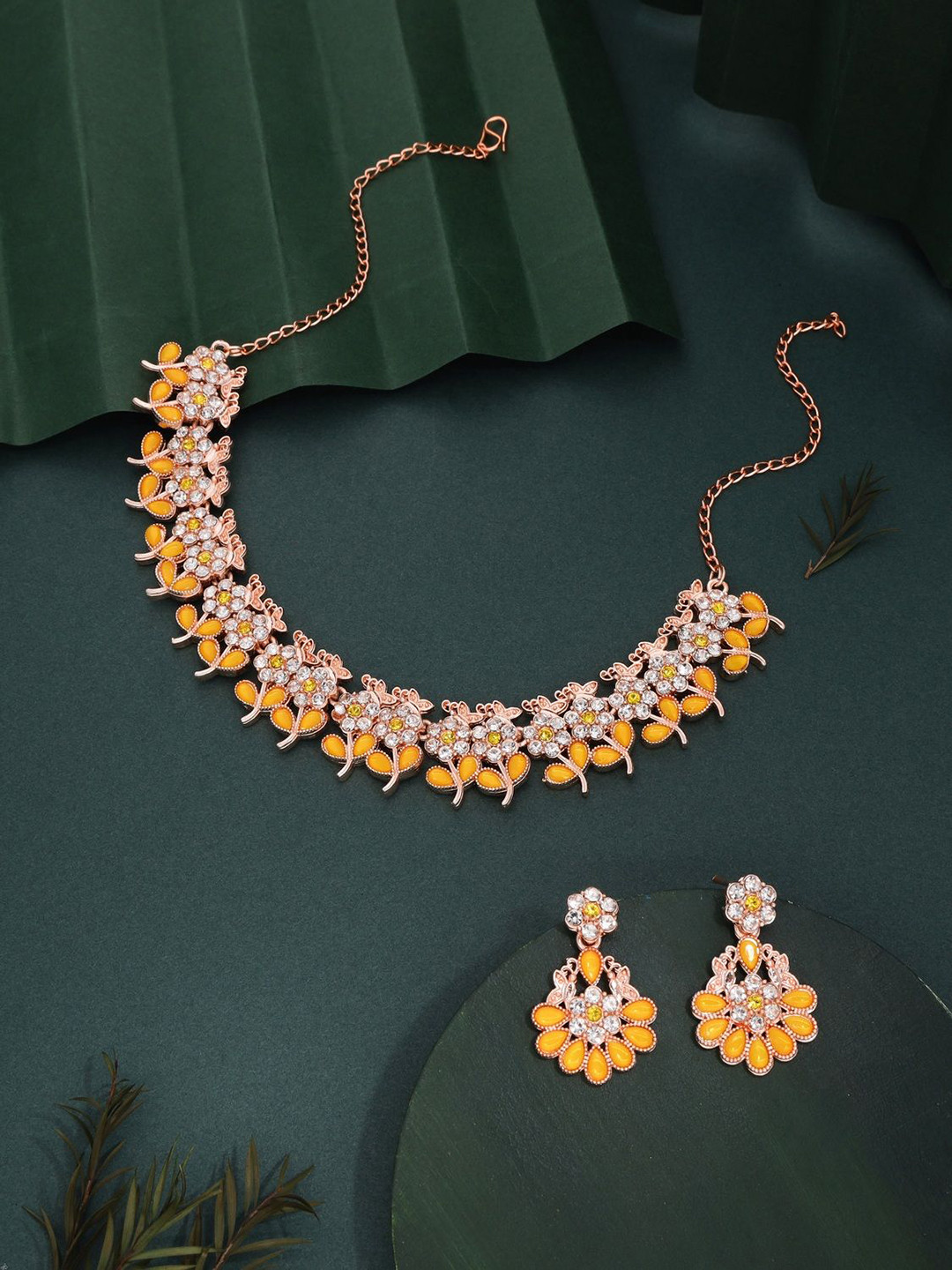 

Lyriss Gold-Plated American Diamond Studded Necklace and Earrings