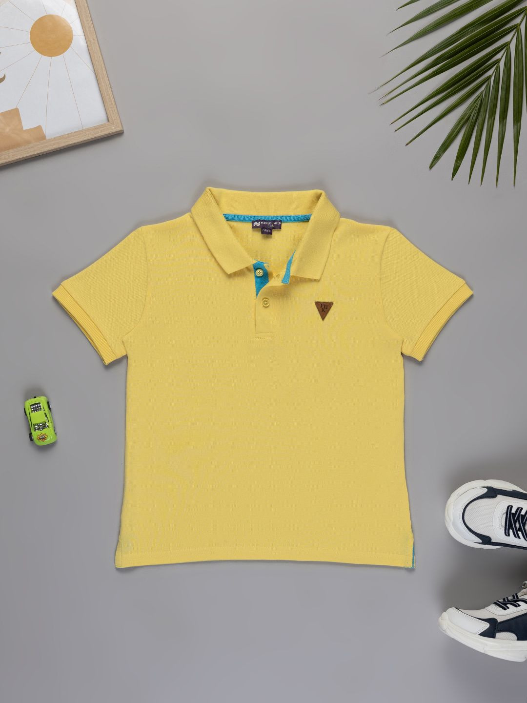

Purple United Kids Boys Solid Polo Collar Cotton T-shirt, Yellow