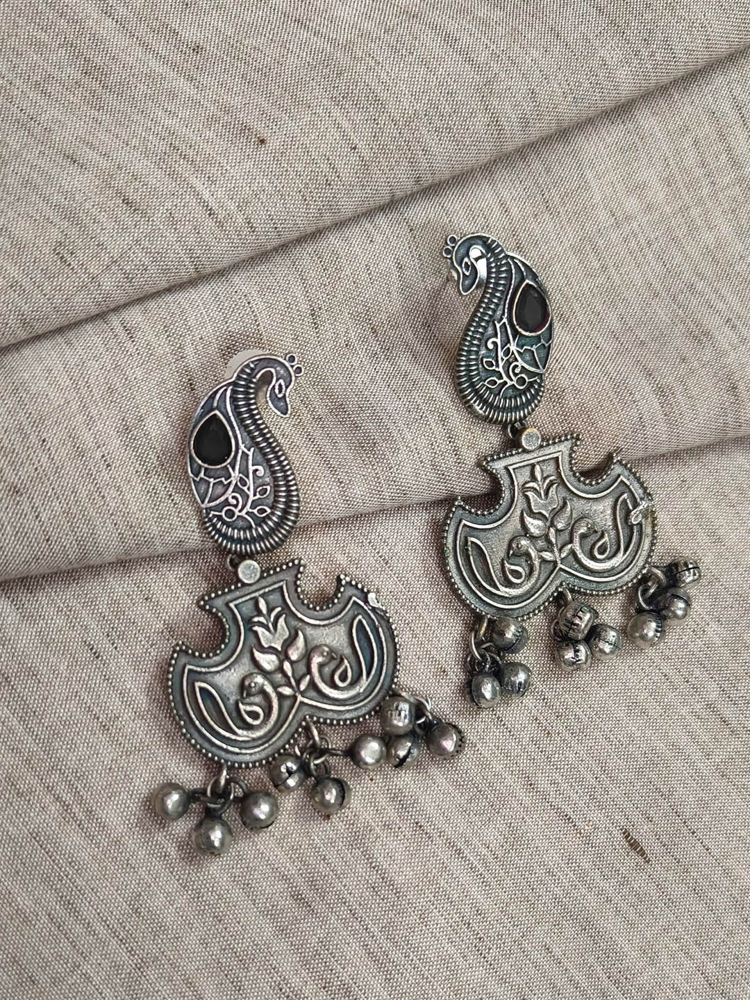 

Molcha Artificial Stones Studded Peacock Shaped Oxidised Drop Earrings, Silver