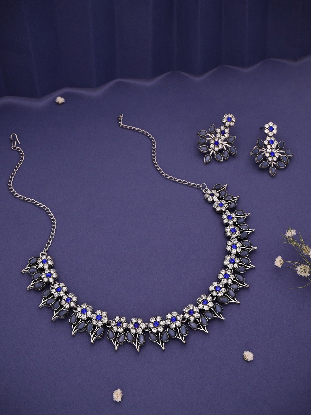 

Lyriss Silver-Plated American Diamond Studded Necklace And Earrings