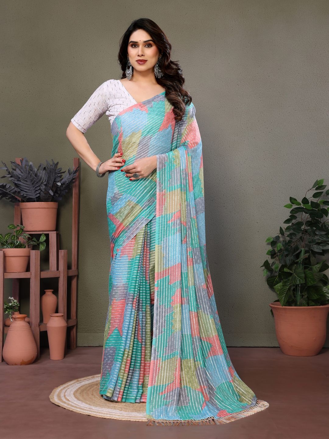 

SILKWEAR Pure Georgette Block Print Saree, Turquoise blue