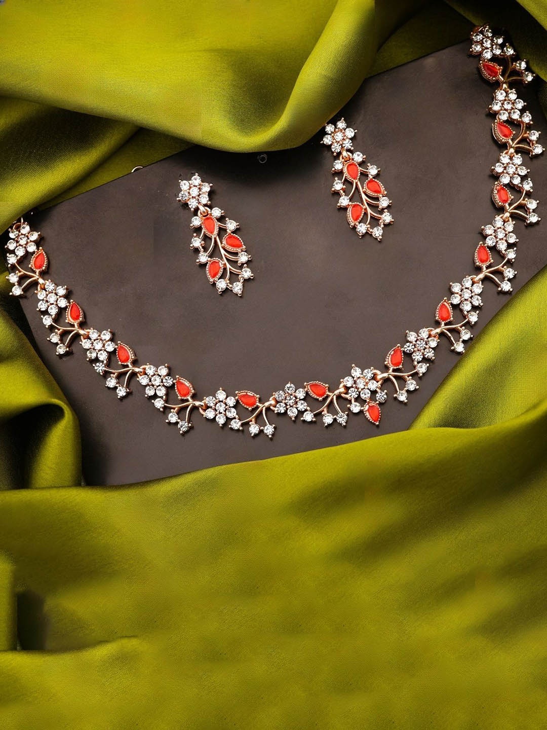 

Lyriss Gold-Plated Artificial Stones Studded Nacklace With Earrings