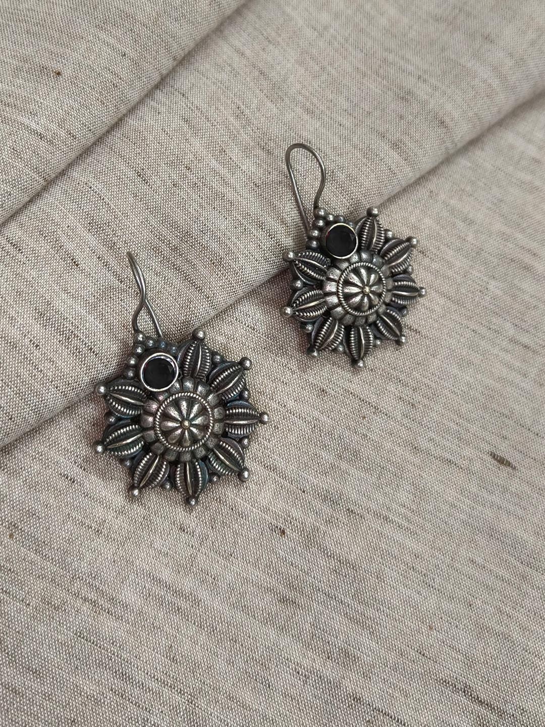 

Molcha Artificial Stones Studded Floral Shaped Oxidised Drop Earrings, Silver