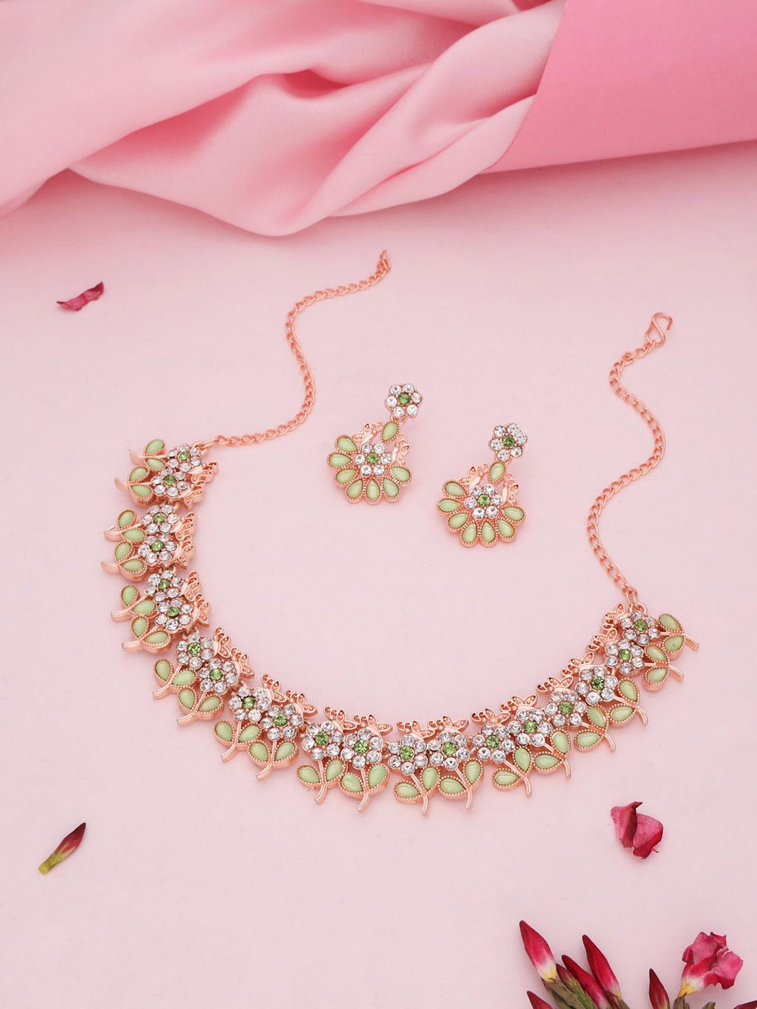 

Lyriss Gold-Plated American Diamond Studded Floral Shaped Jewellery Set