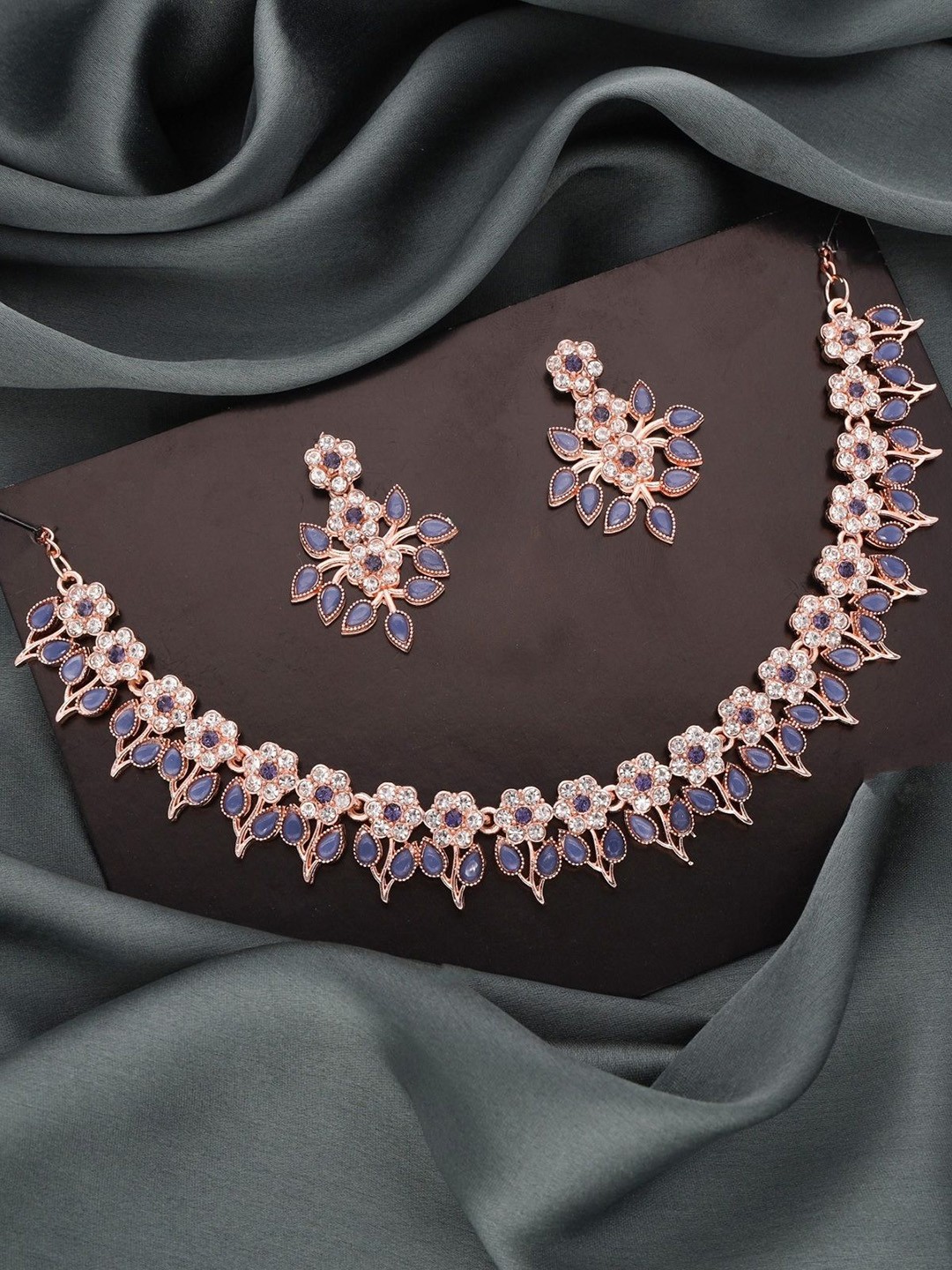 

Lyriss Gold-Plated American Diamond Studded Necklace And Earrings