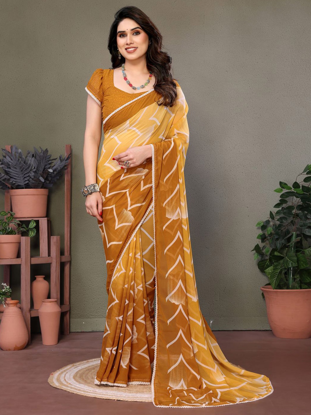 

SILKWEAR Pure Georgette Block Print Saree, Mustard