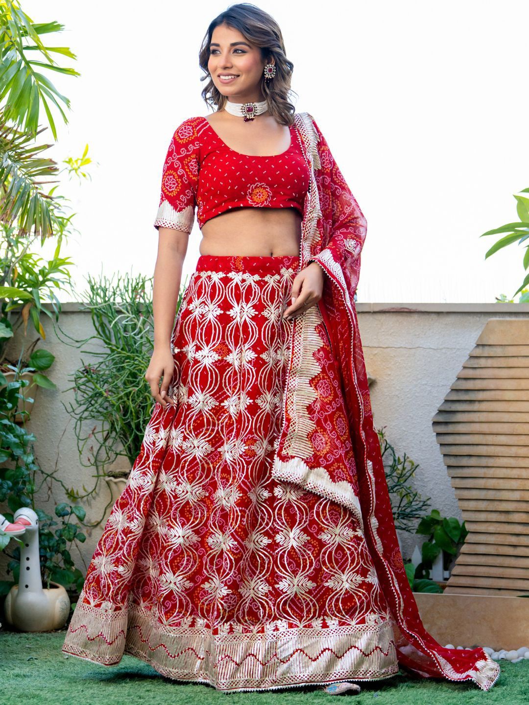 

PRETTY PALLU Bandhani Printed Round Neck Lehenga With Blouse & Dupatta, Red