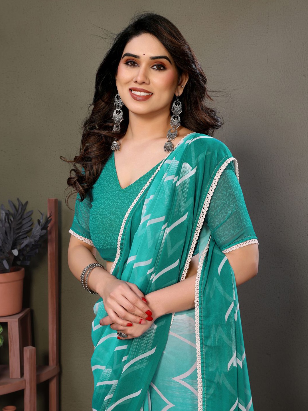 

SILKWEAR Pure Georgette Block Print Saree, Turquoise blue