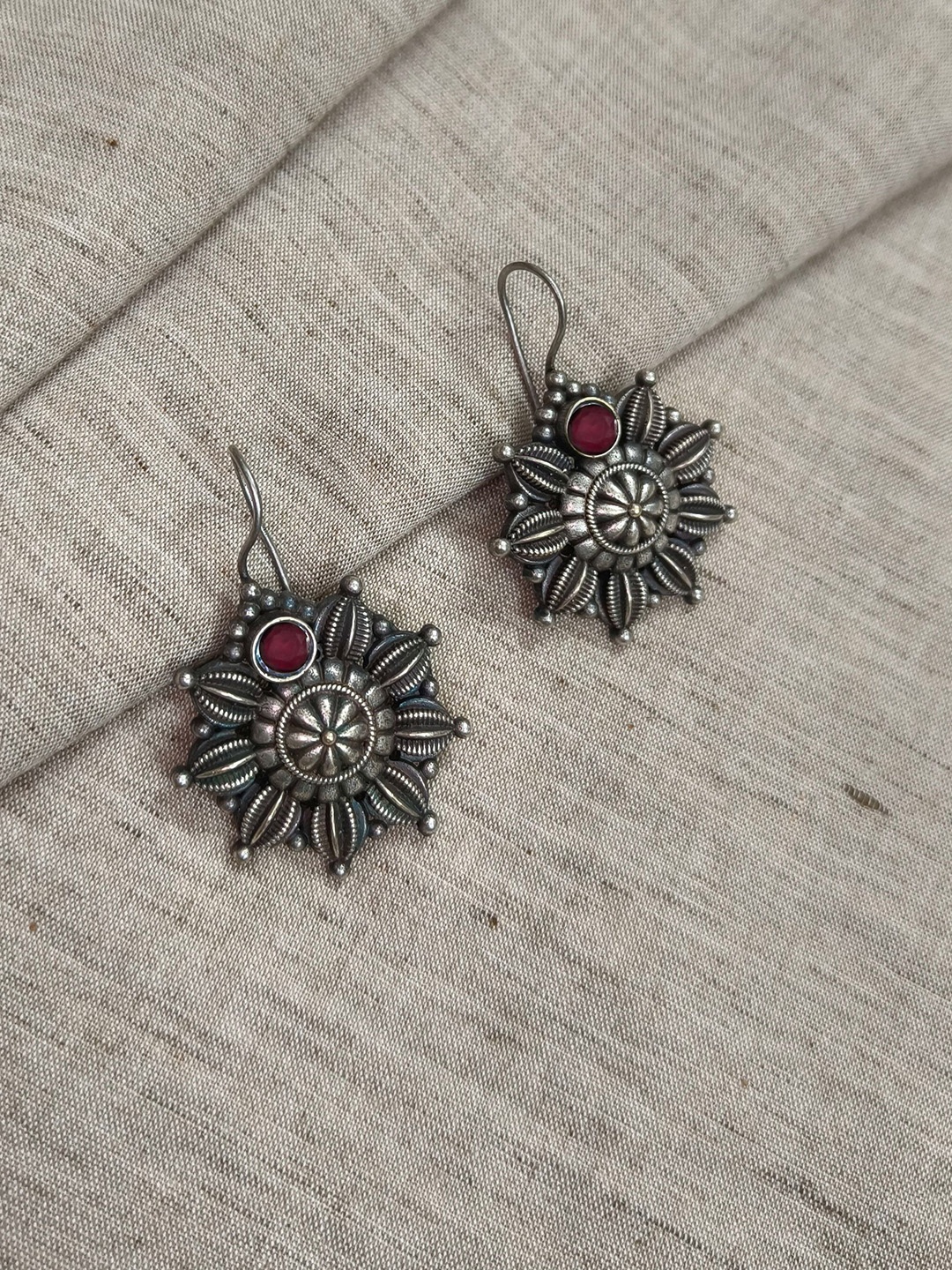 

Molcha Artificial Stones Studded Floral Shaped Oxidised Drop Earrings, Silver
