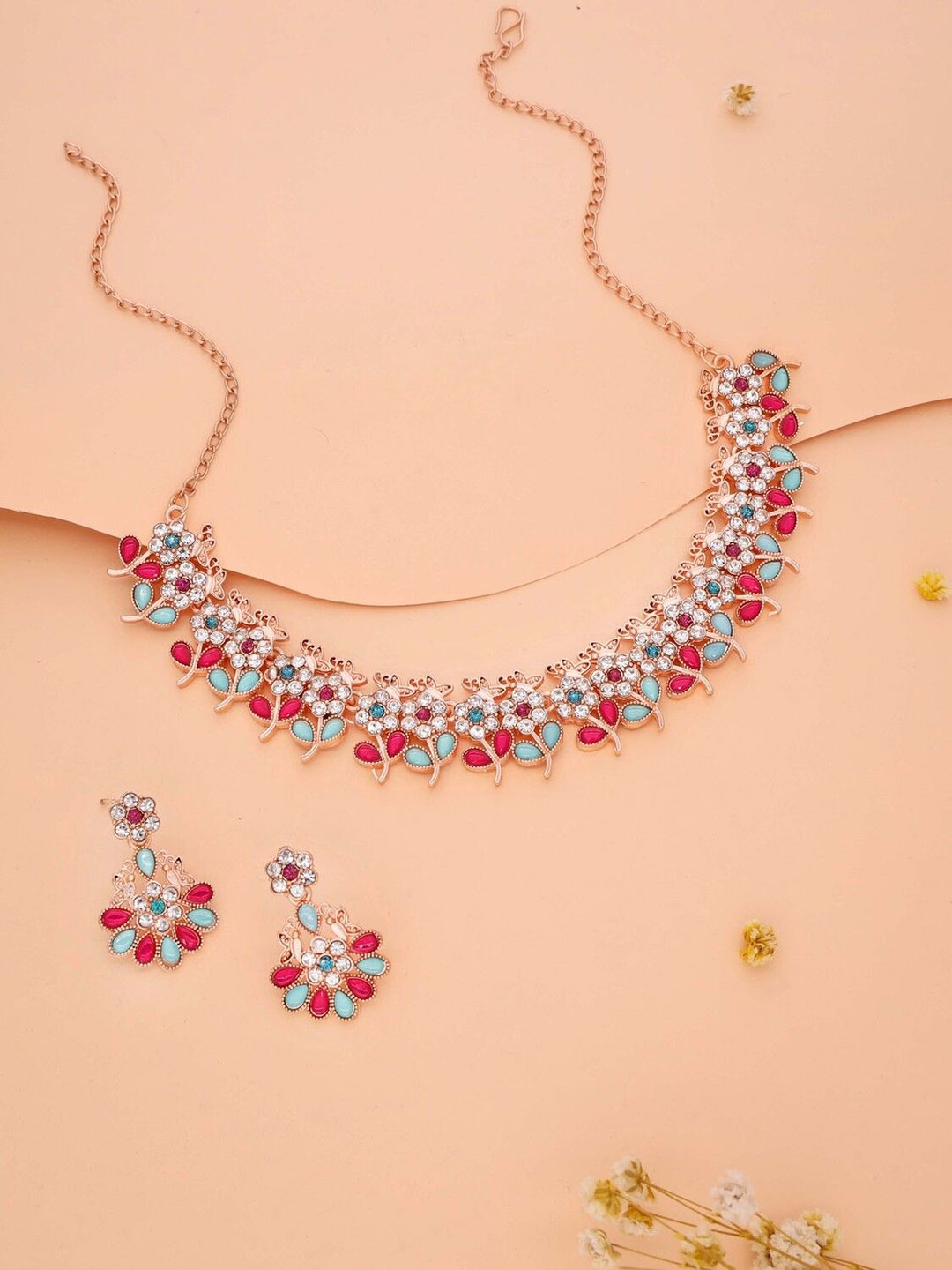 

Lyriss Gold-Plated American Diamond Studded Necklace and Earrings