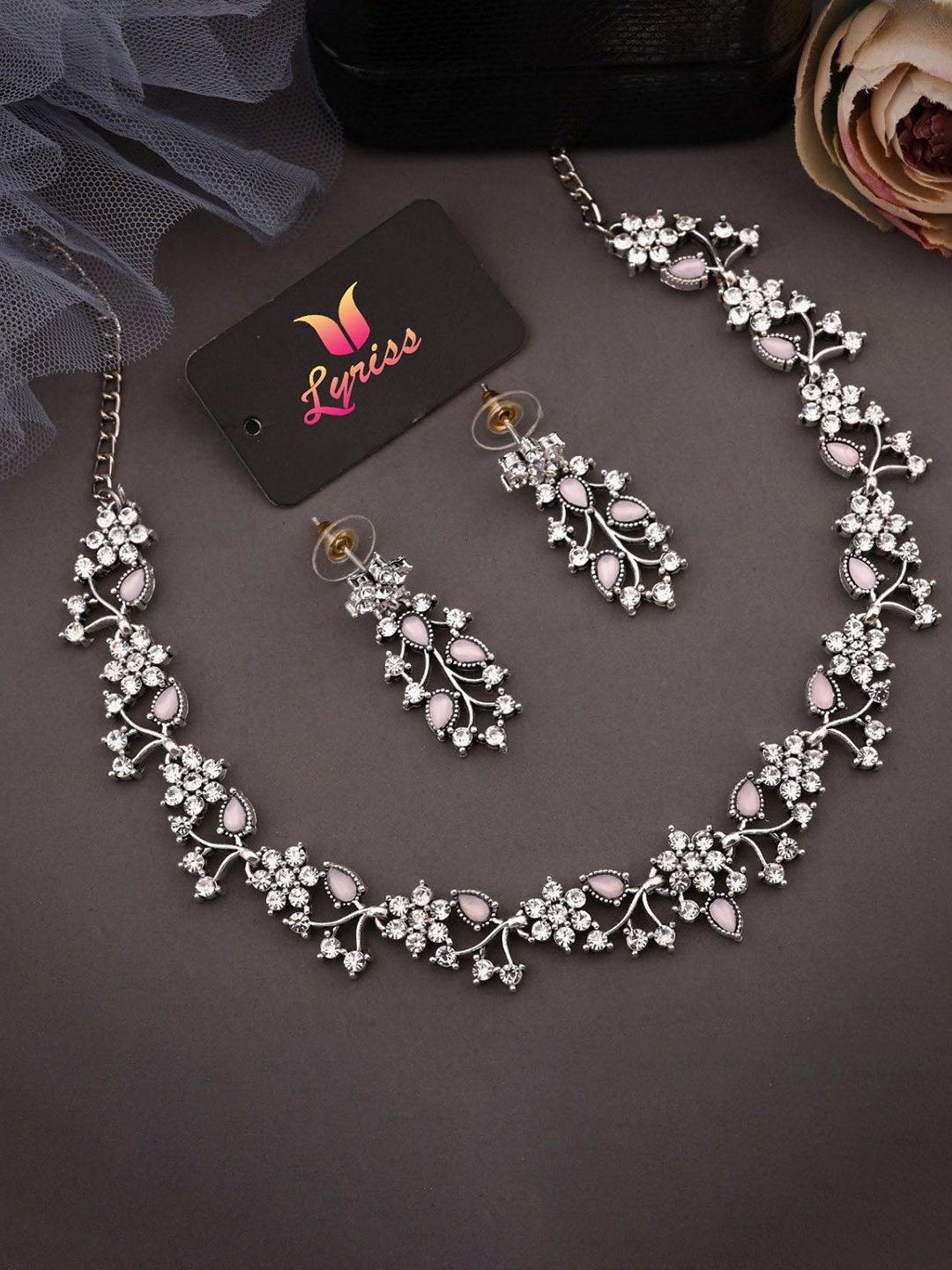 

Lyriss Silver-Plated Artificial Stones Studded Nacklace With Earrings