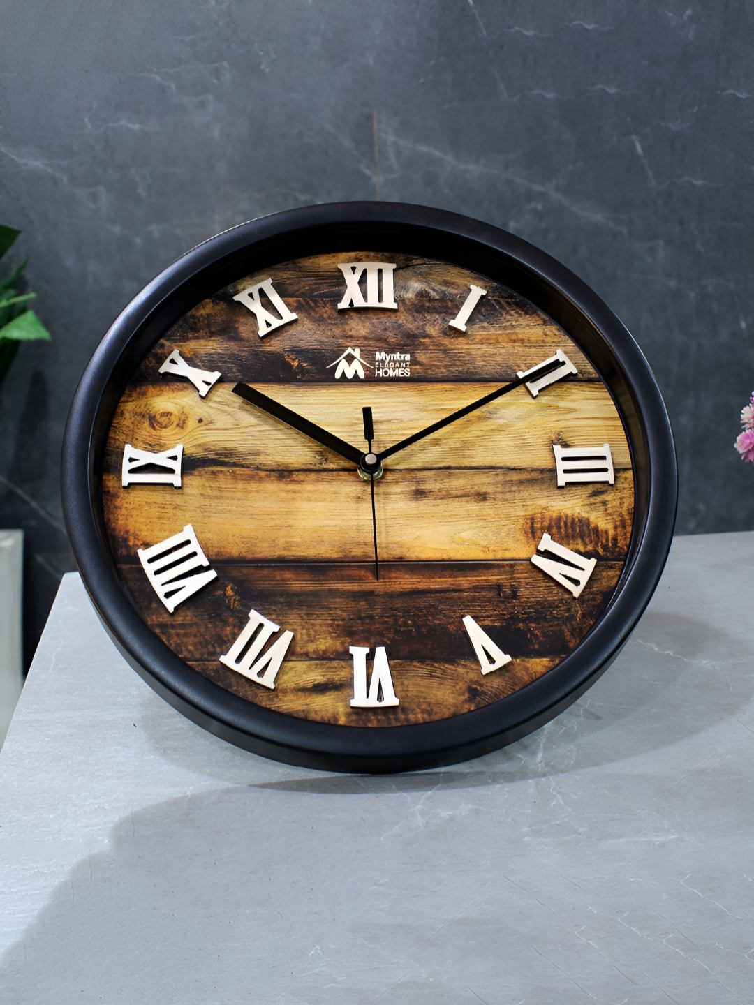 

Myntra Elegant Homes 12" Embossed Dial Wall Clock Brown Contemporary Wall Clock