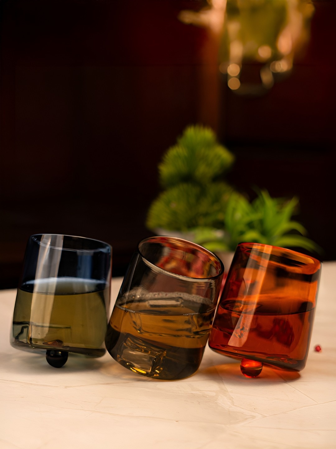 

Aura Blue & Brown 6 Pieces Borosilicate Amber Spinning Bar Glasses