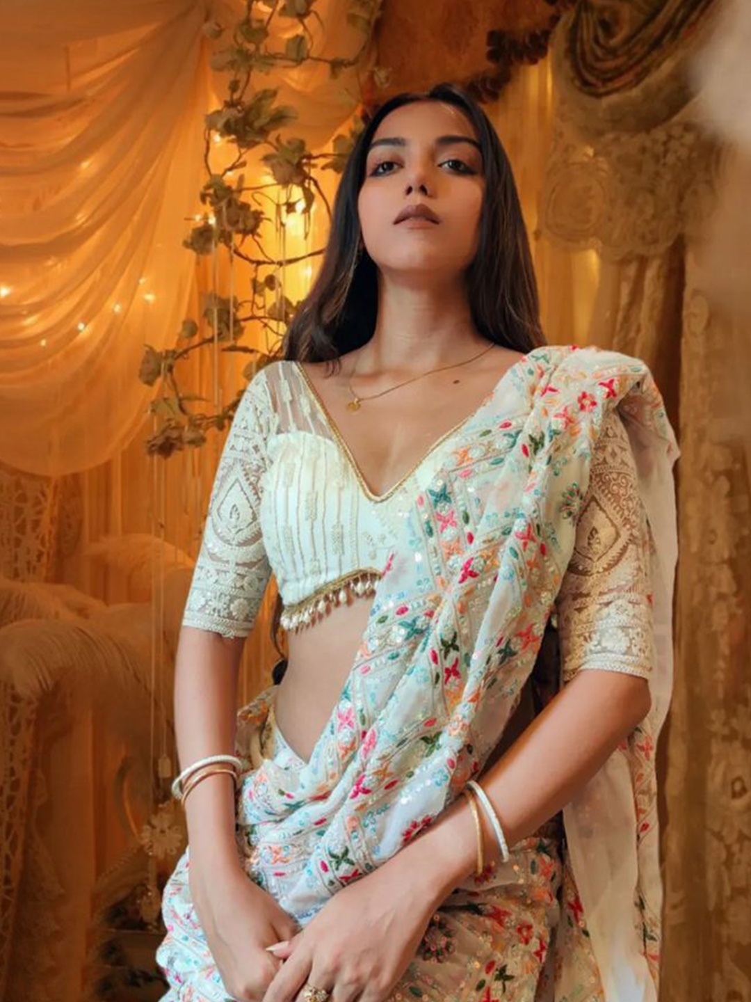 

Rujave Ethnic Motifs Sequinned Pure Georgette Saree, White
