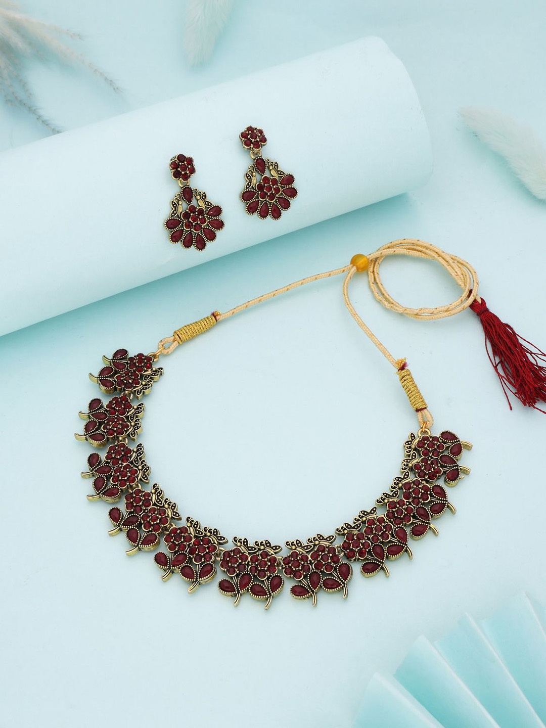 

Lyriss Gold-Plated Artificial Stones Studded Nacklace With Earrings