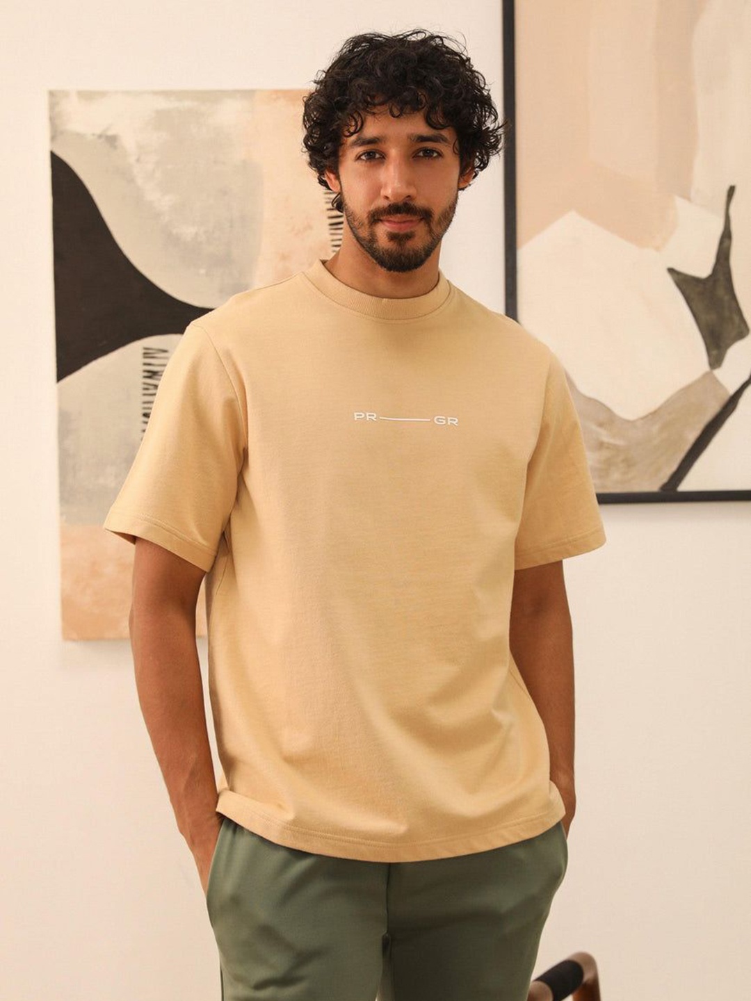 

PRIMAL GRAY Men Typography Printed Round Neck Cotton Oversized T-shirt, Beige
