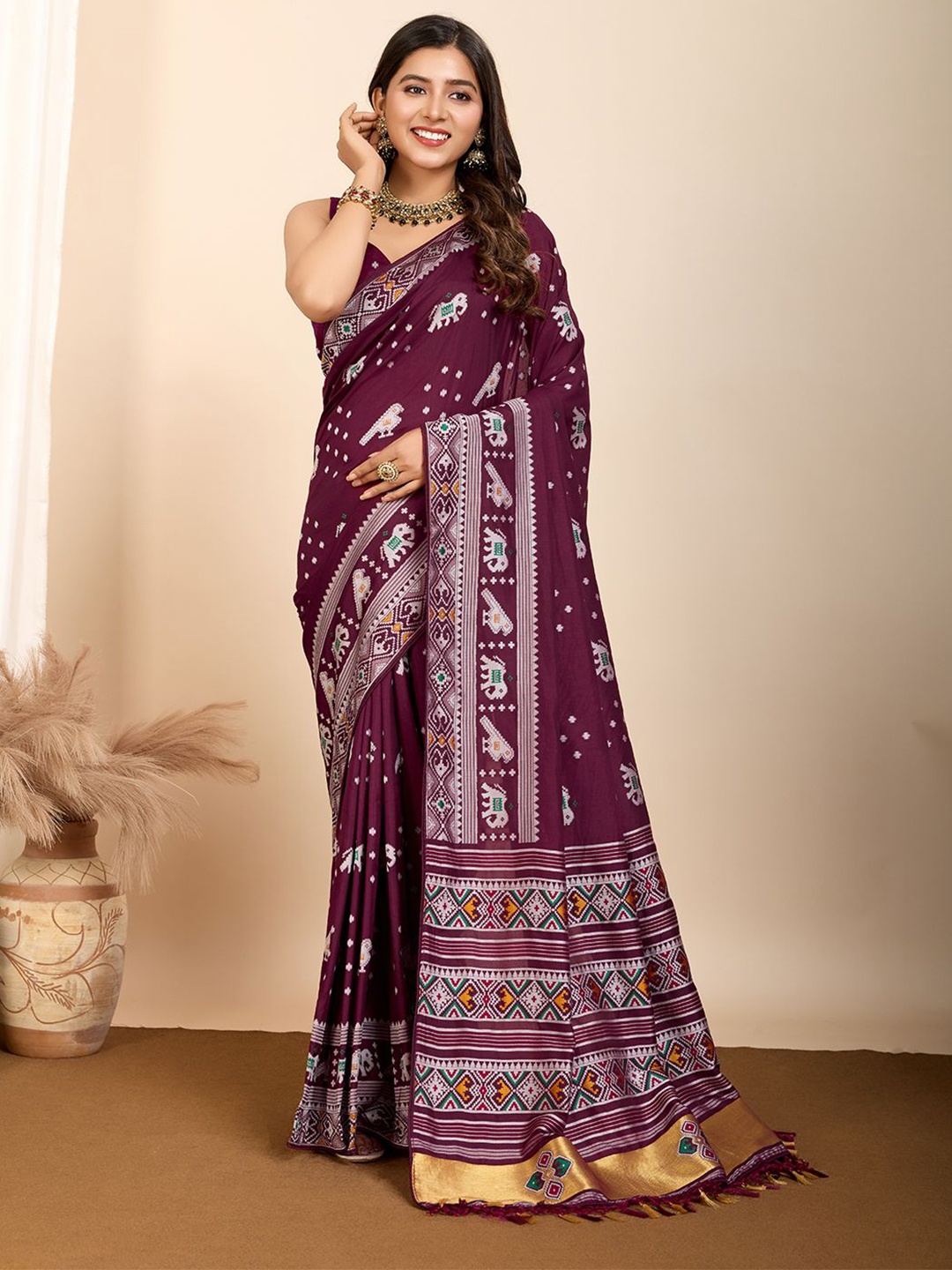 

Nimidiya Woven Design Zari Pure Silk Patola Saree, Magenta