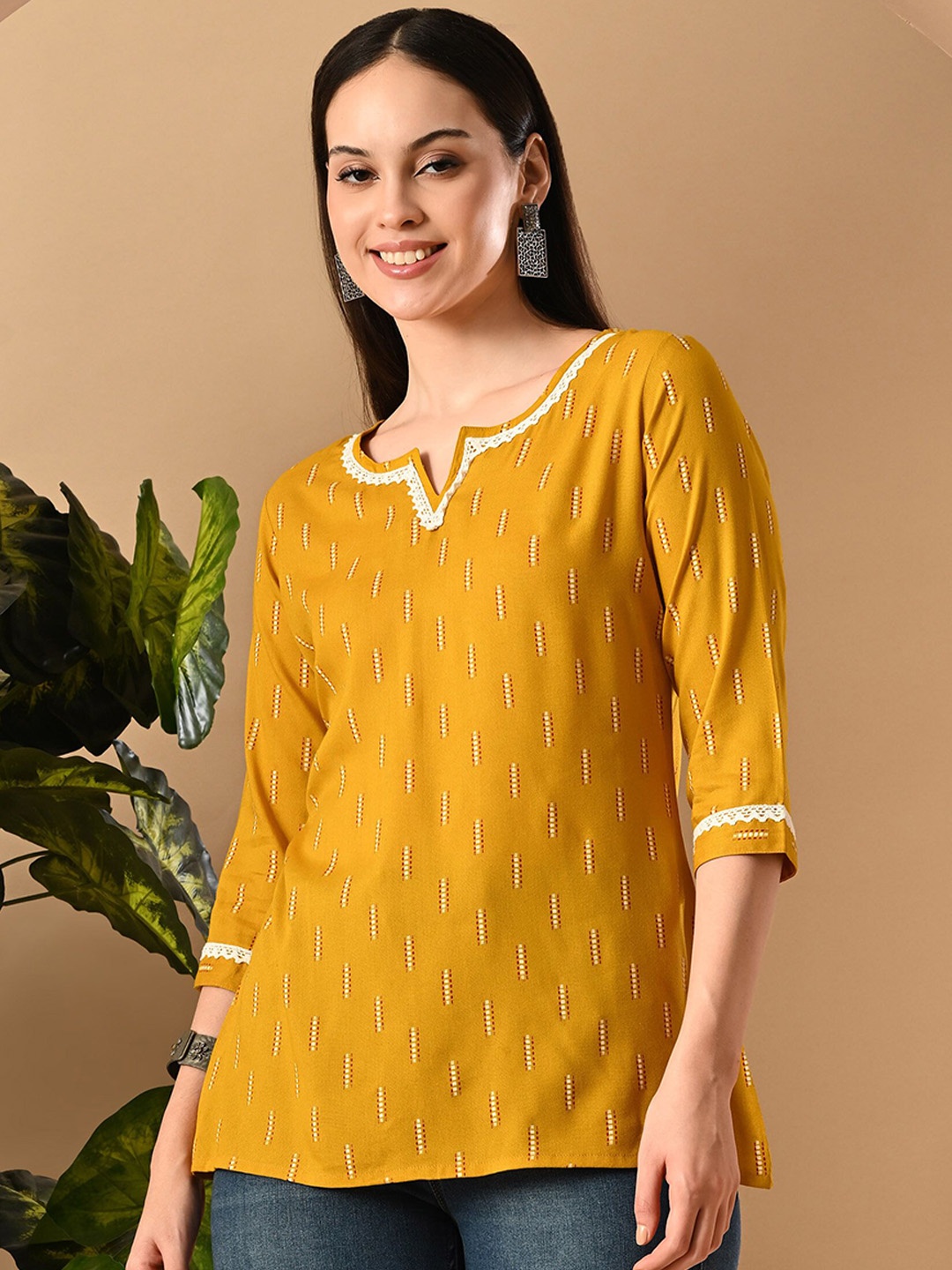 

GLOWWORLD Geometric Printed Notch Neck Thread Work Straight Short Kurti, Mustard