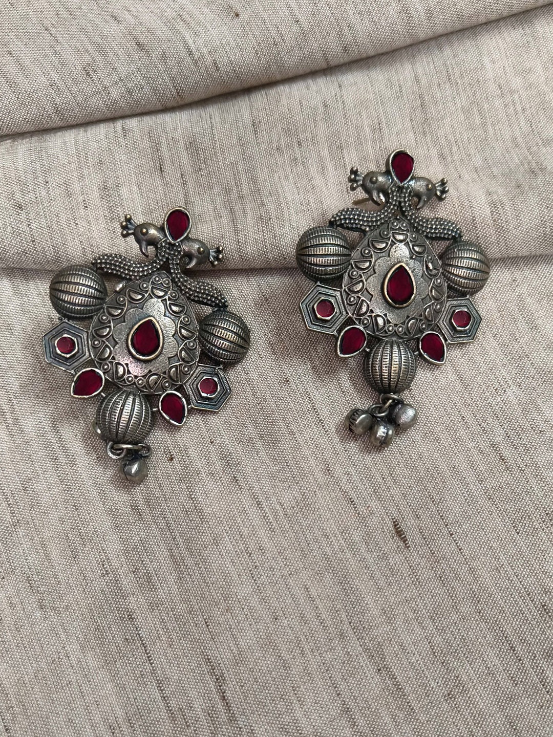 

Molcha Artificial Stones Studded Peacock Shaped Oxidised Drop Earrings, Silver