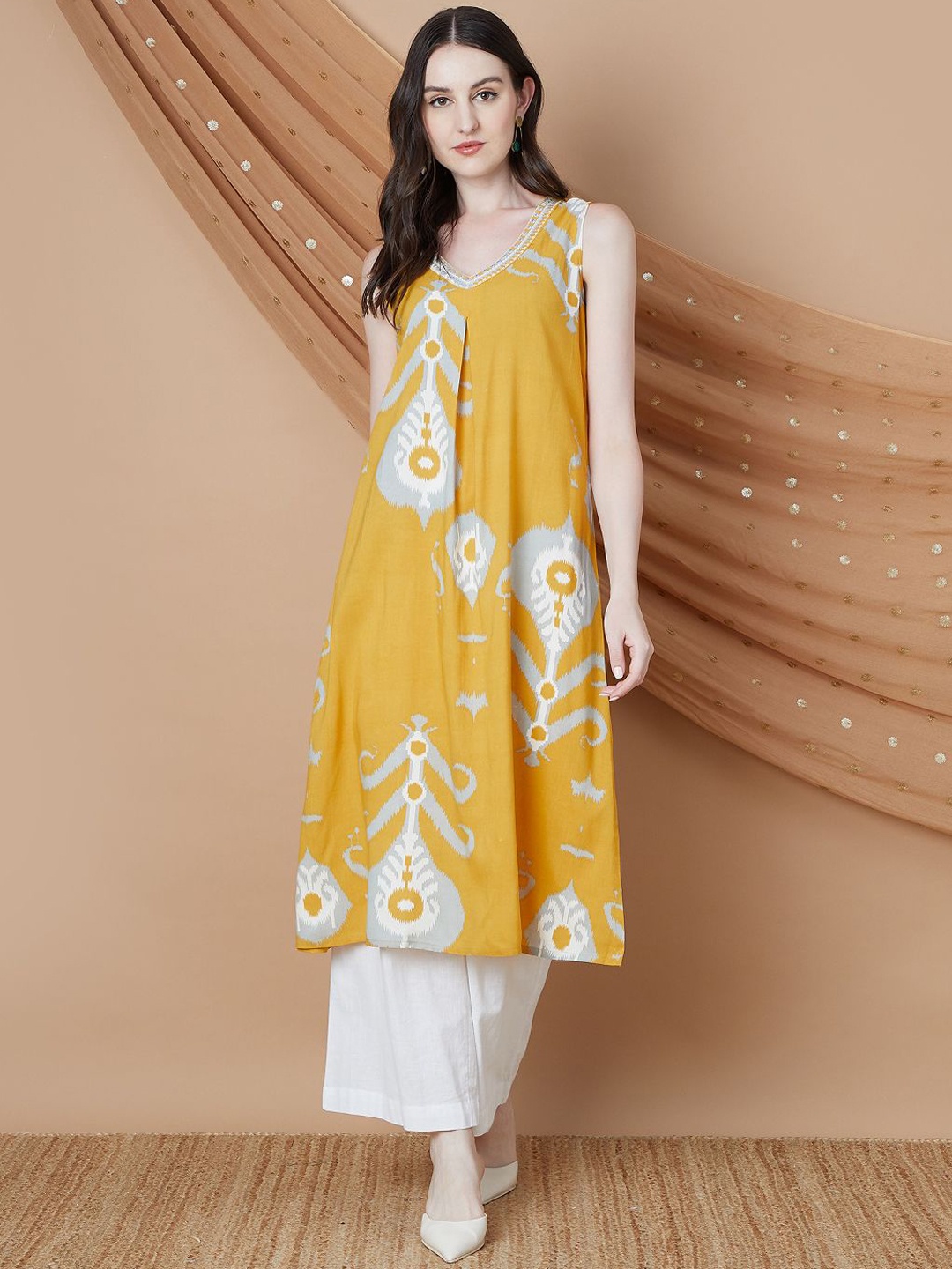 

Melange by Lifestyle Ethnic Motifs Printed V-Neck Straight Kurta, Mustard