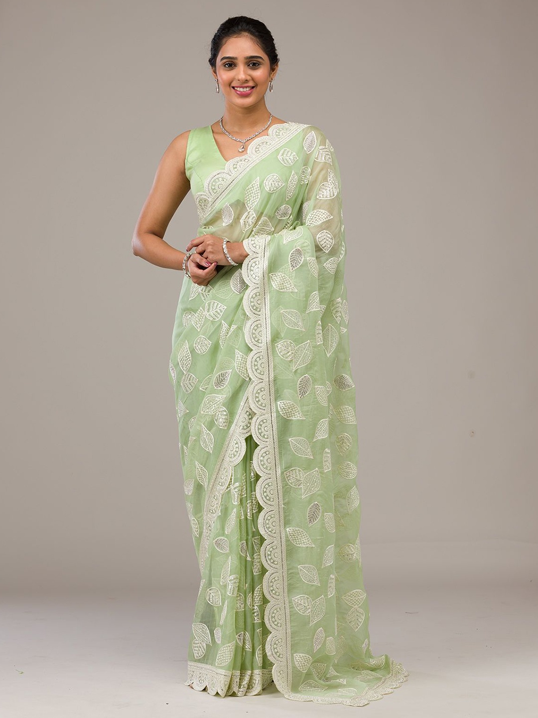 

Koskii Pista Green Threadwork Organza Saree