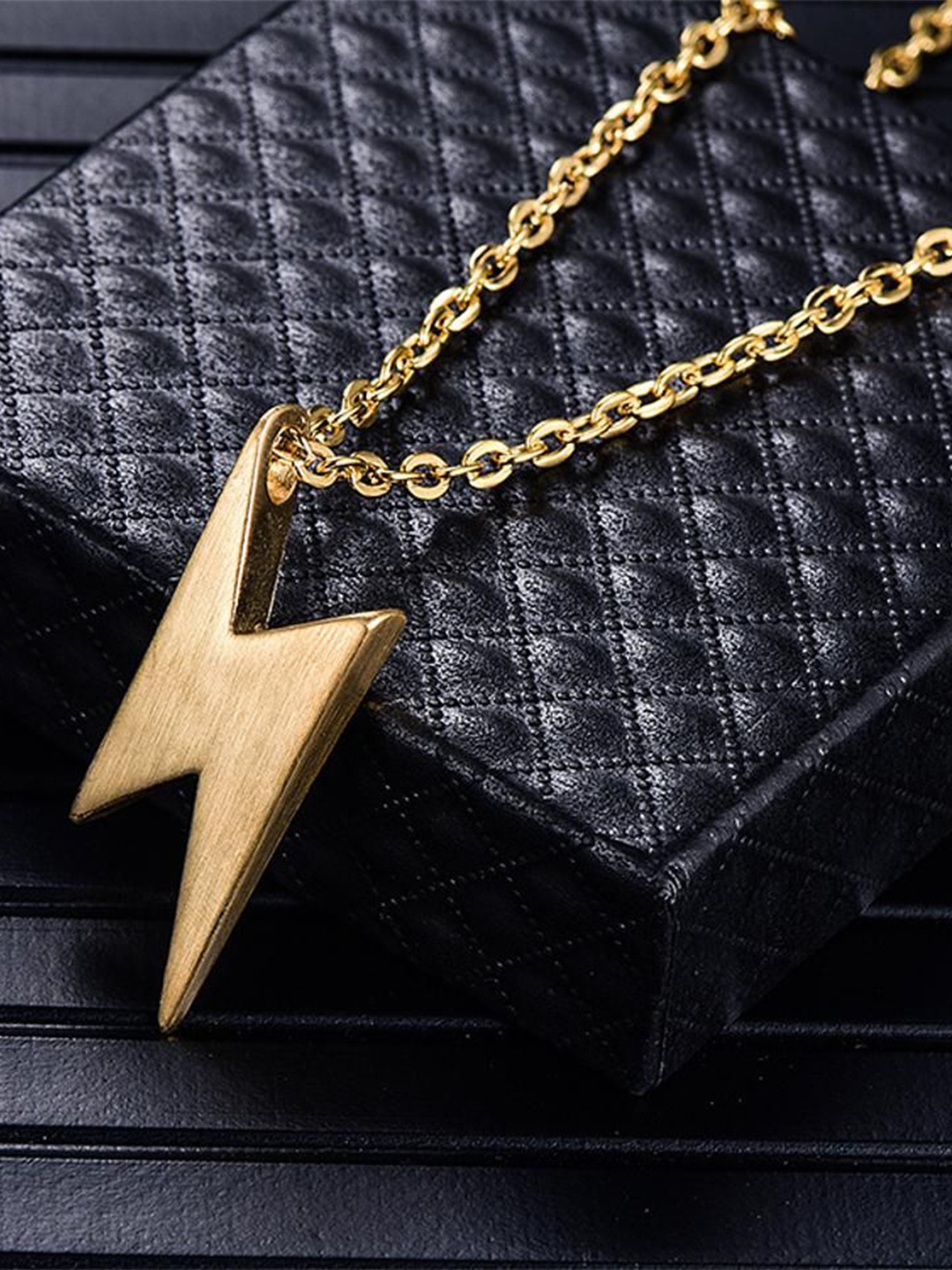 

shobhram Men Stainless Steel Gold-Plated Flash Shaped Pendant With Chain