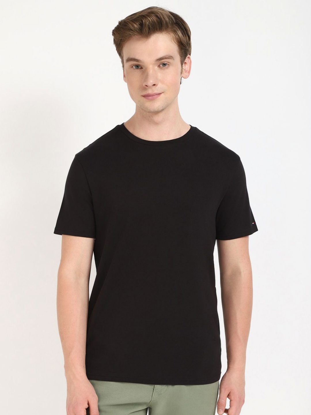 

Tommy Hilfiger Men Solid Round Neck Cotton T-shirt, Black