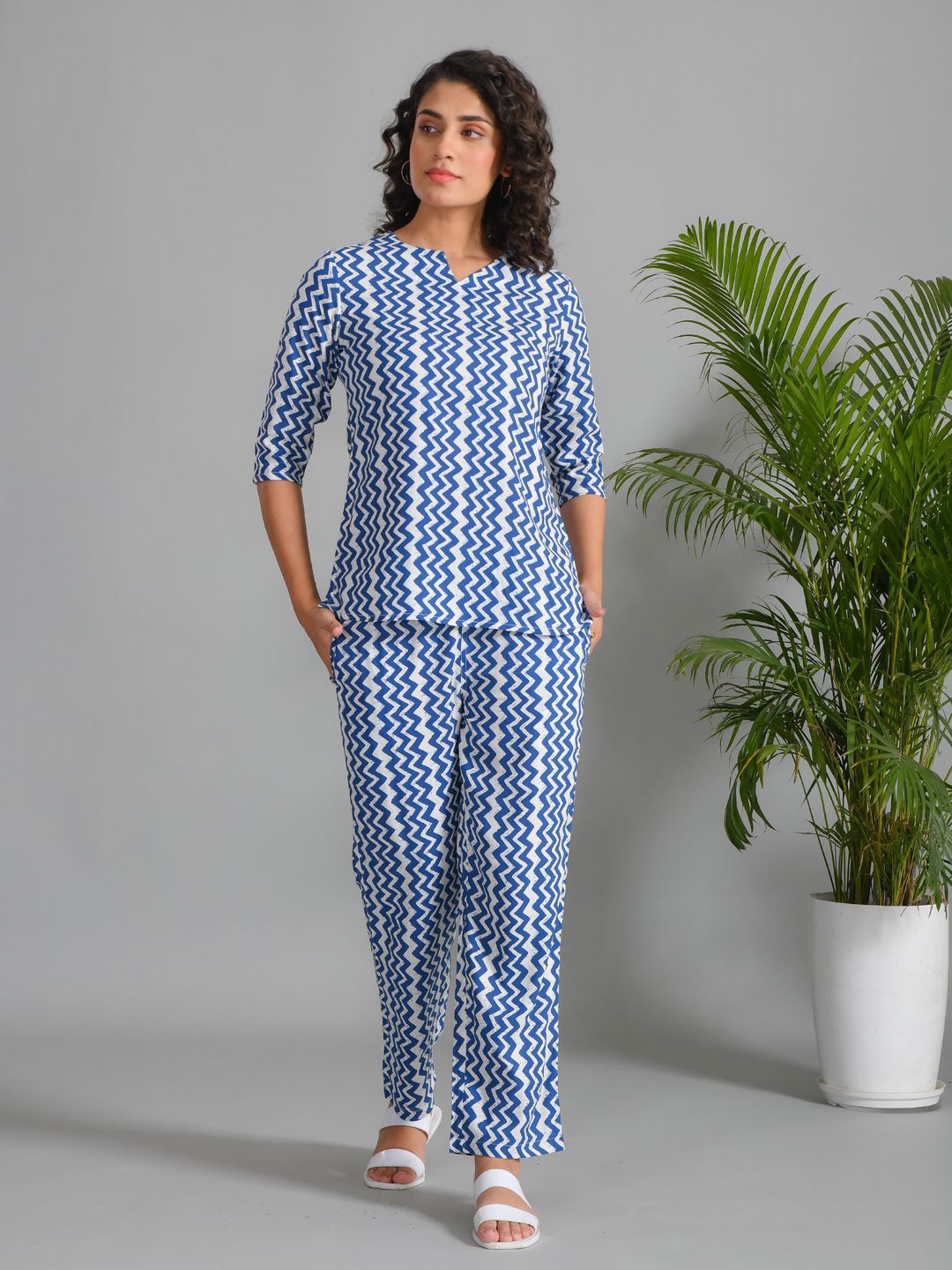 

SANSKRUTIHOMES Women Printed V-Neck Top With Trouser Co-Ords, Navy blue