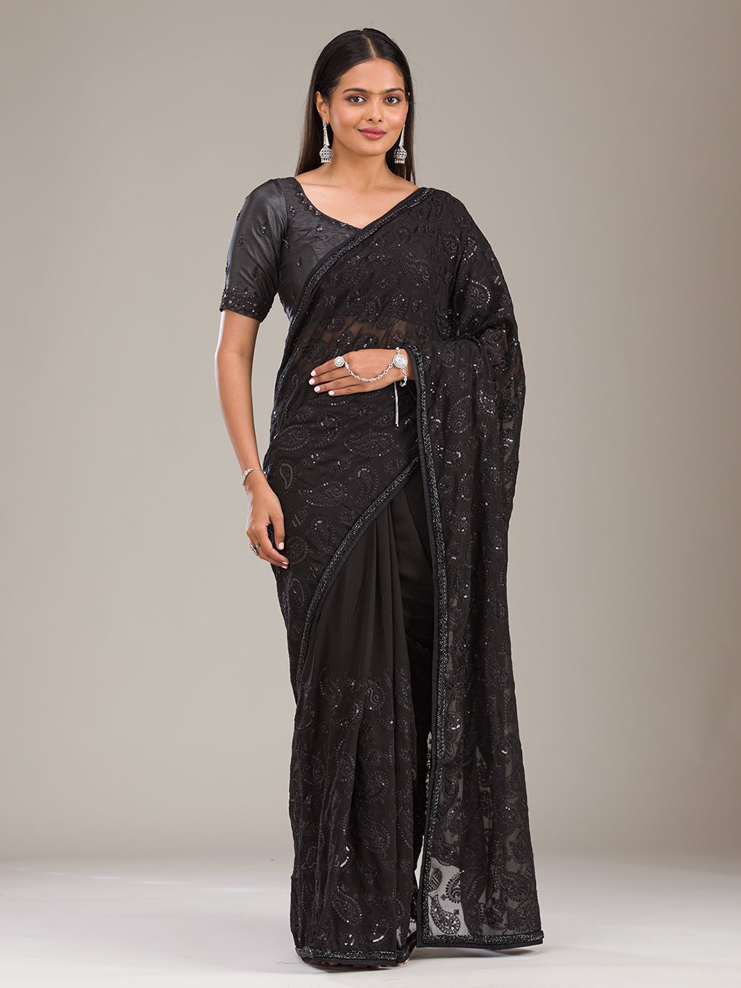 

Koskii Ethnic Motifs Black Cutdana Tissue Saree