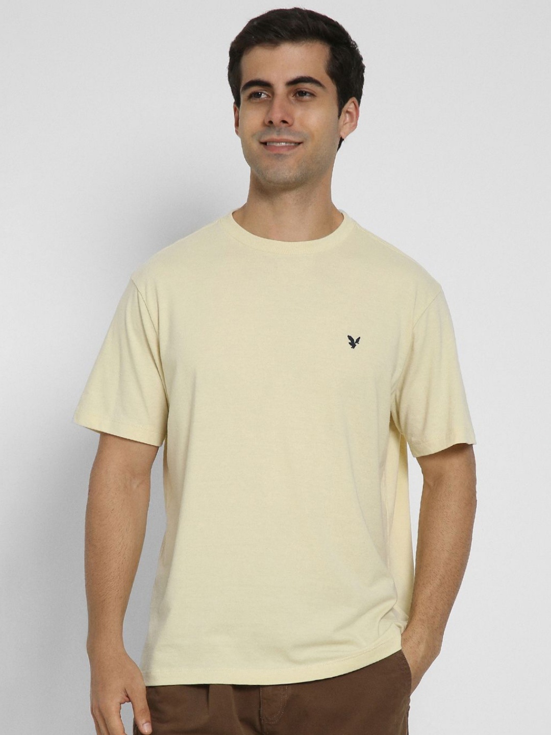 

AMERICAN EAGLE OUTFITTERS Men Solid Round Neck Cotton T-shirt, Yellow