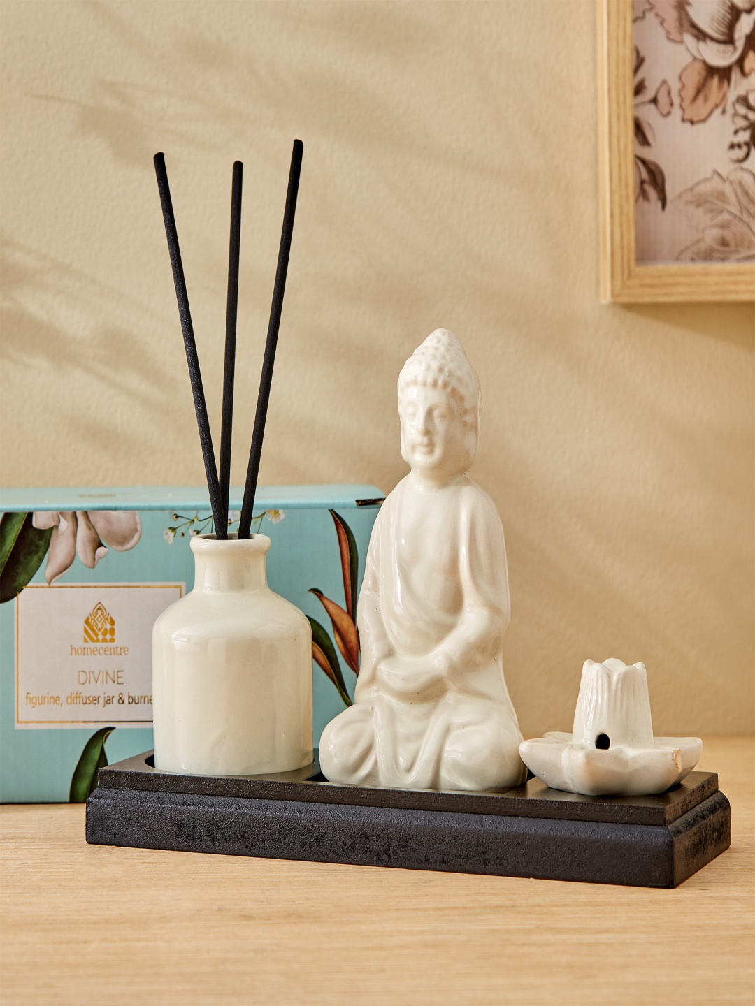 

Home Centre 4 Pieces White & Black Buddha Reed Ceramic Diffuser Set