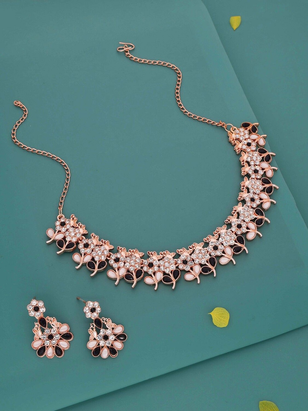 

Lyriss Gold-Plated American Diamond Studded Necklaces And Earrings