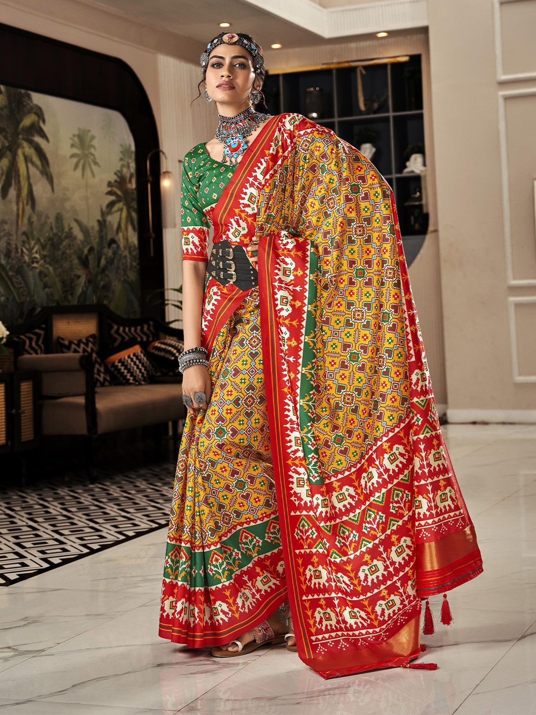 

Mitera Ethnic Motifs Printed Zari Patola Saree, Yellow