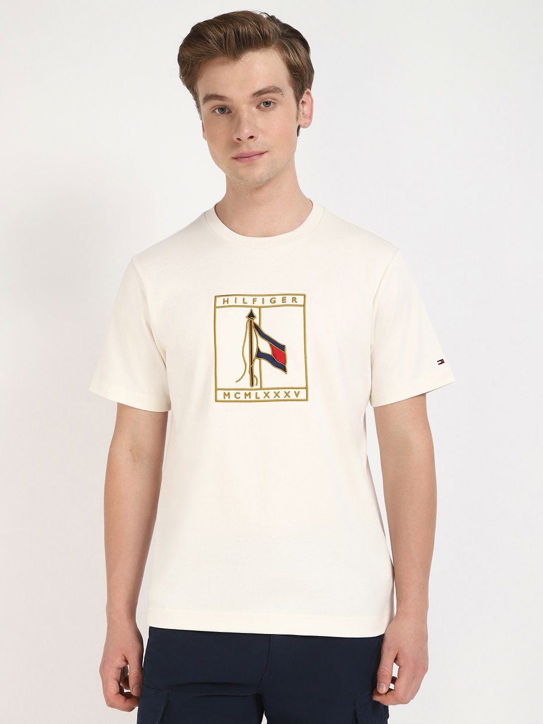 

Tommy Hilfiger Men Graphic Printed Round Neck Cotton T-shirt, Off white