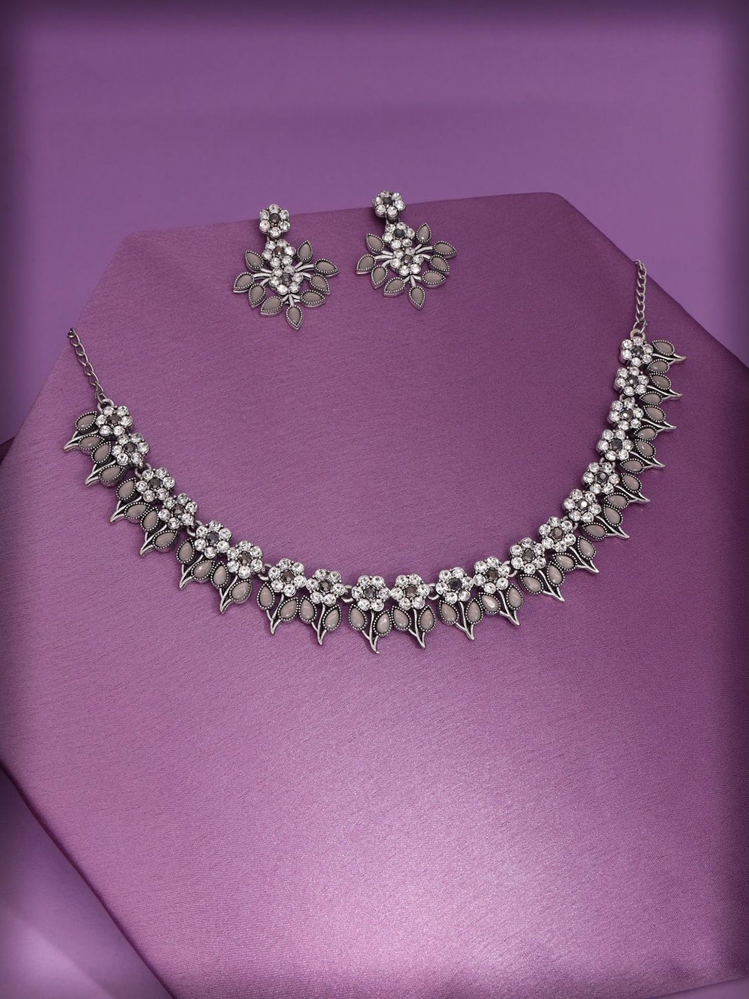 

Lyriss Silver-Plated American Diamond Studded Jewellery Set