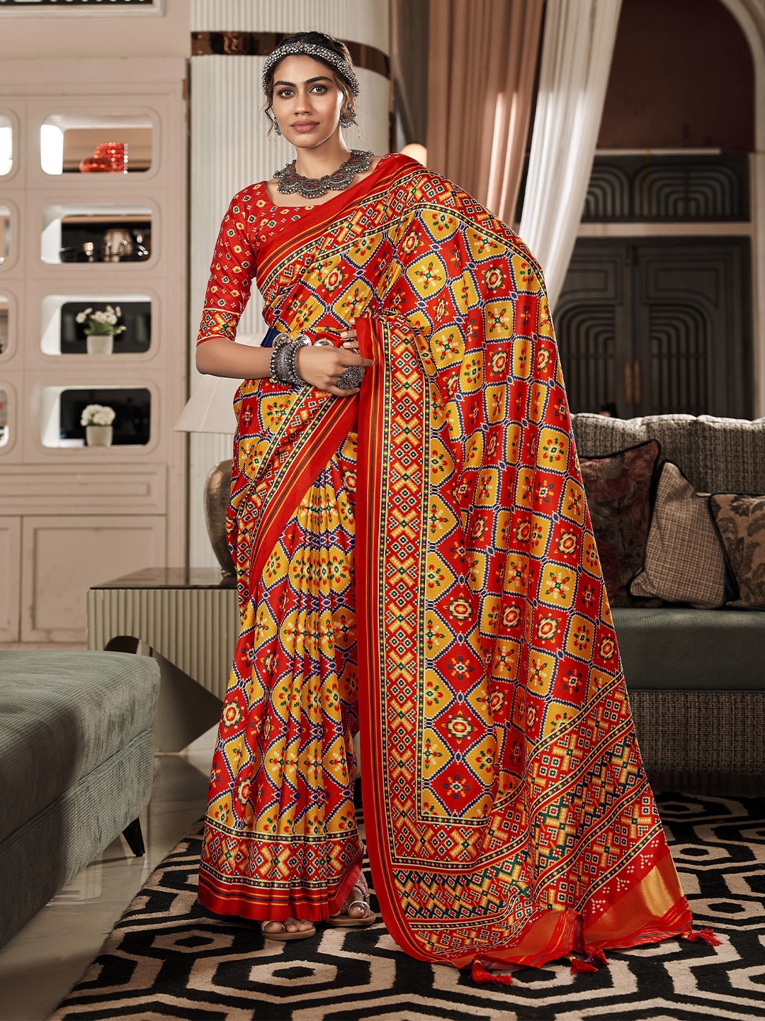 

Mitera Ethnic Motifs Woven Design Zari Patola Saree, Red