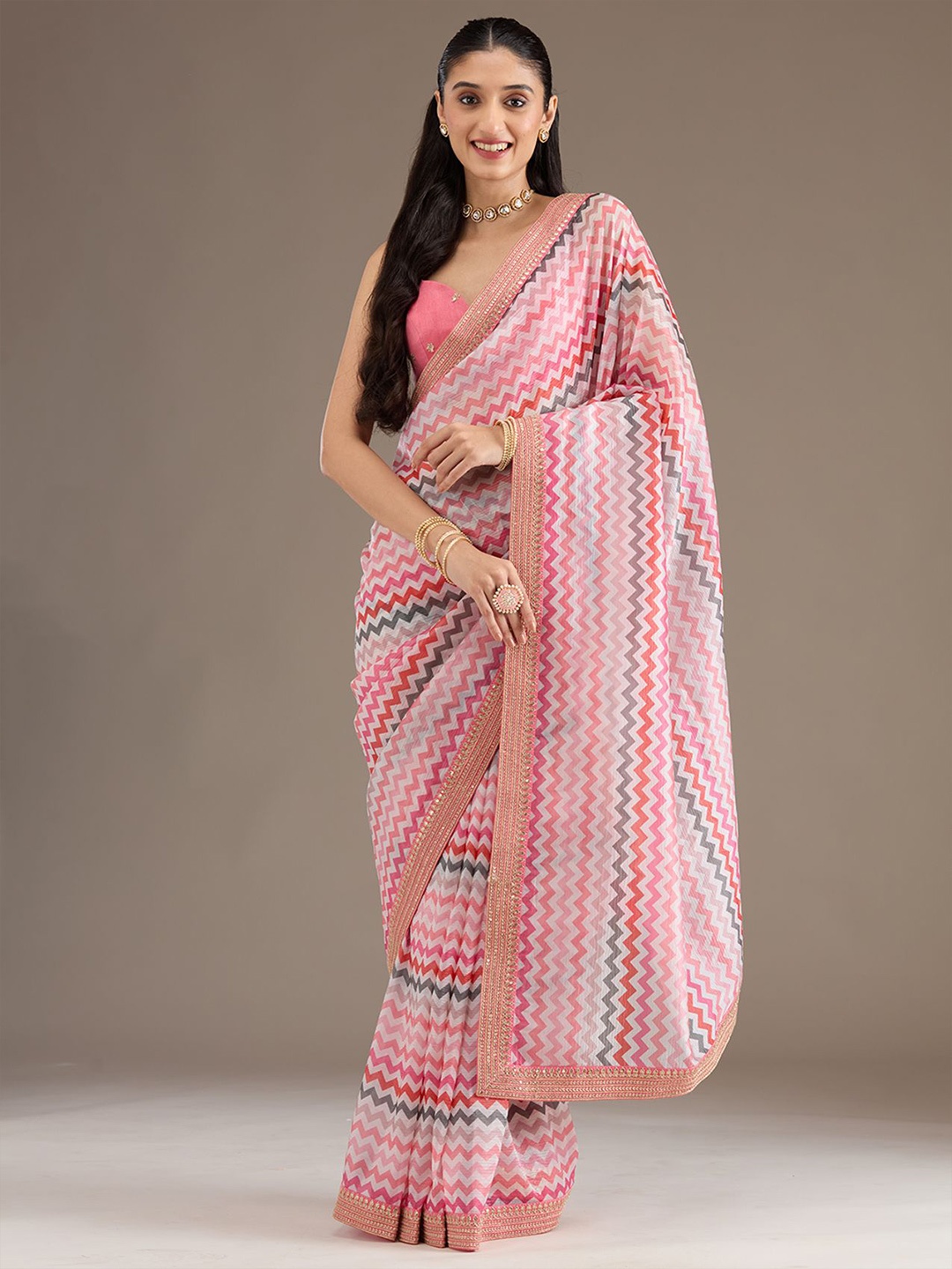 

Koskii Rani Pink Sequins Tissue Saree