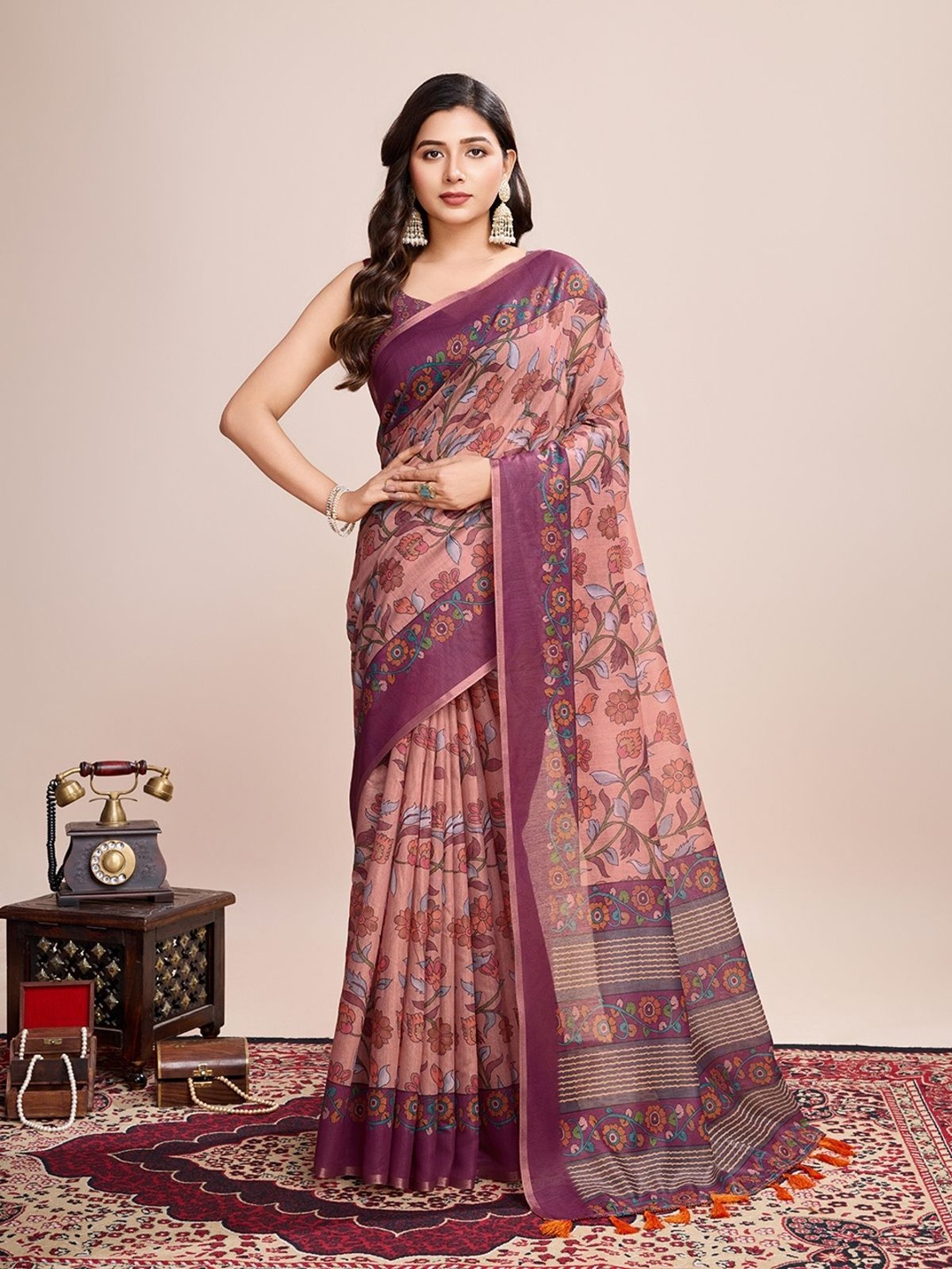 

ODETTE Peach Linen Printed Saree With Unstitched Blouse