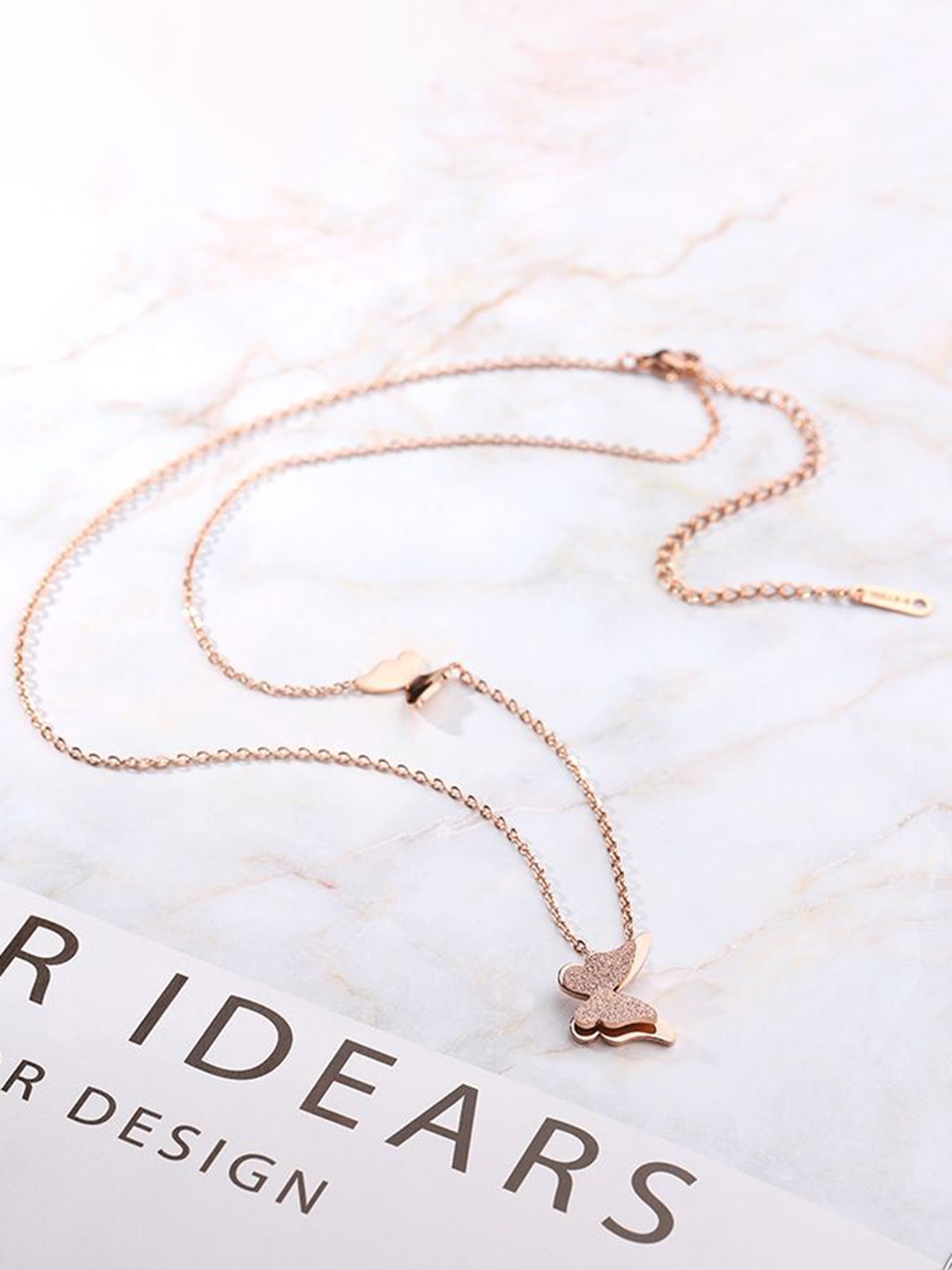 

DressBerry Rose Gold-Plated Butterfly Shaped Pendant With Chain
