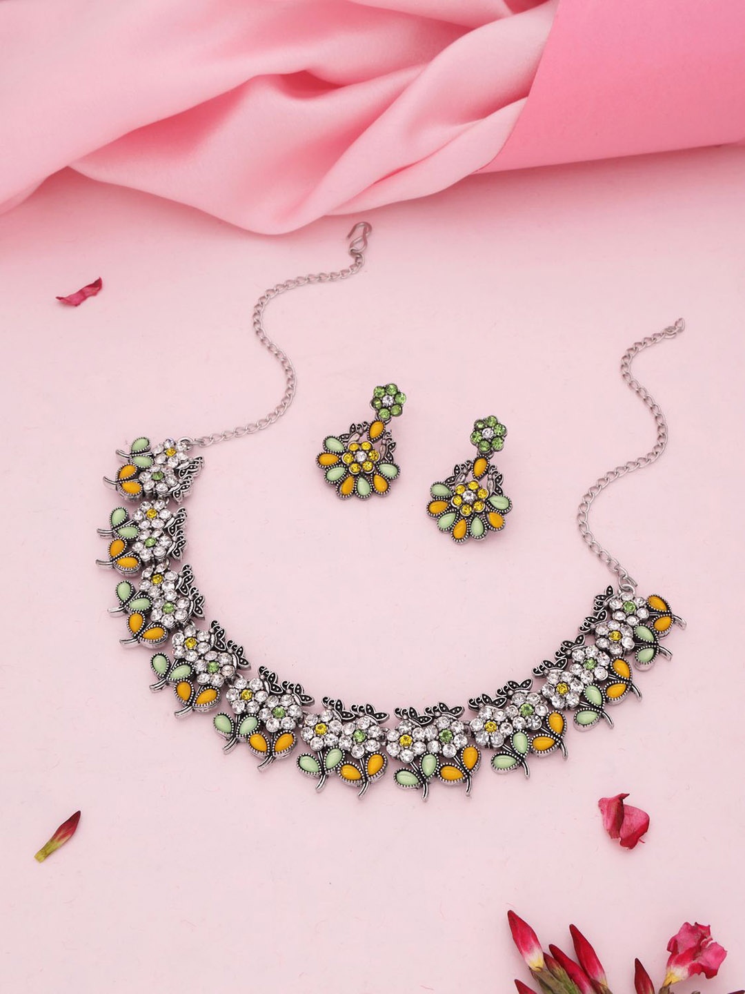 

Lyriss Silver-Plated American Diamond Studded Necklaces And Earrings