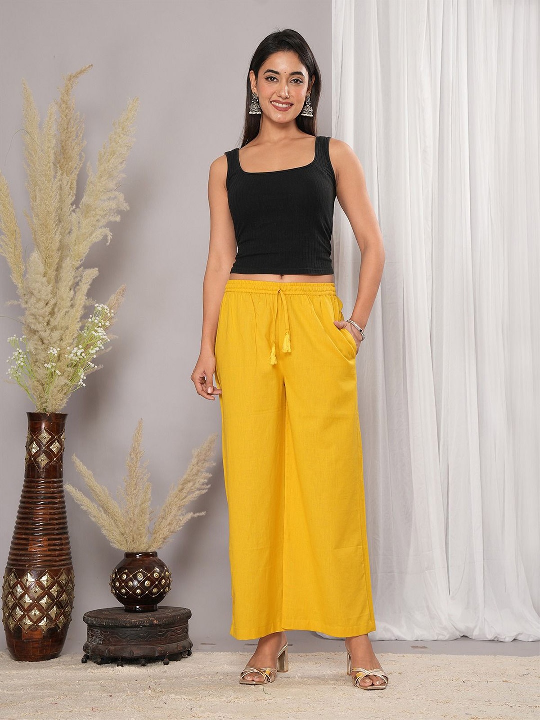 

Aaheli Women Flared Palazzos, Mustard