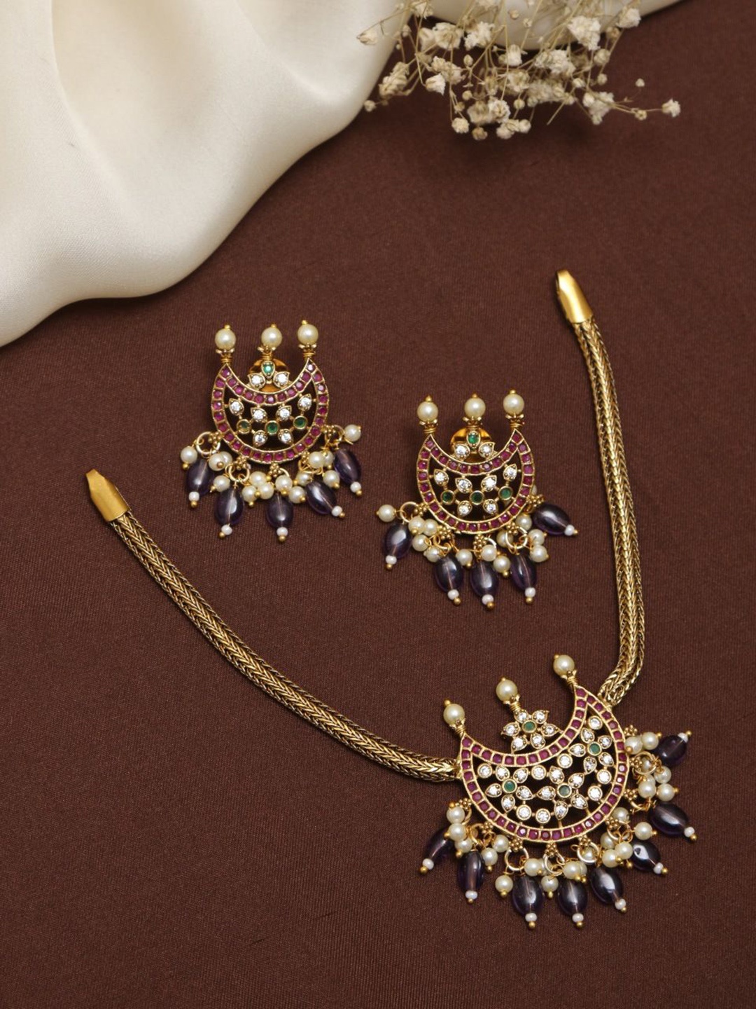 

Kattam Gold Plated Chandbali Halfmoon Purple Choker