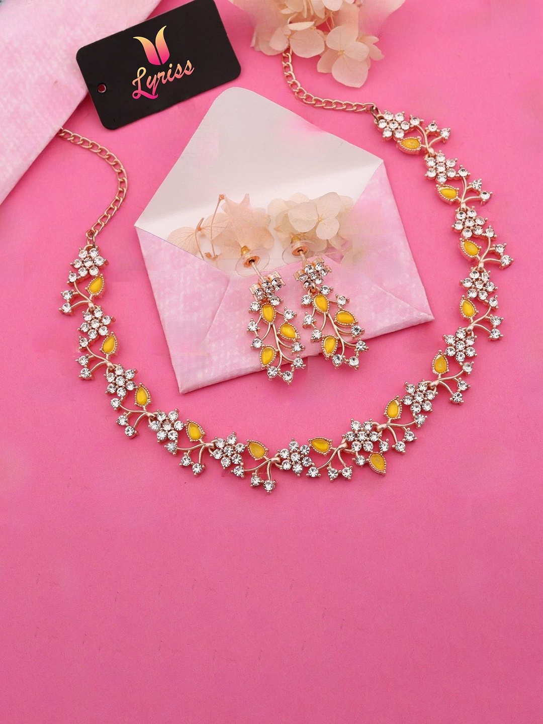

Lyriss Gold-Plated Artificial Stones Studded Nacklace With Earrings