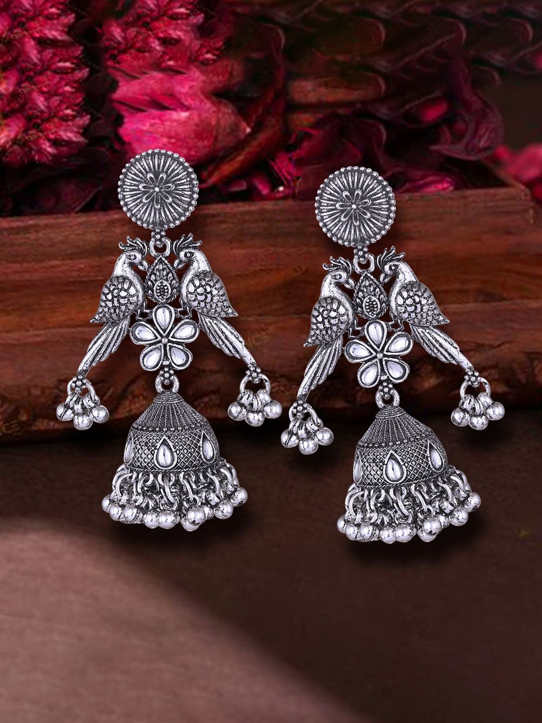 

DIVASTRI Silver-Plated Pearls Beaded & Kundan Studded Peacock Shaped Oxidised Jhumkas