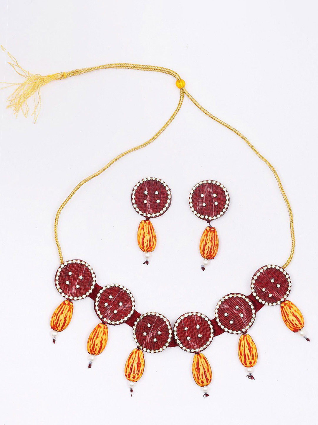 

Exotic India Haute-Red Handloom Sambalpuri Fabric Choker & Earrings Set and Dangling Stone, Gold